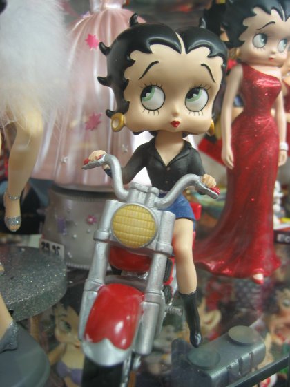 I almost bought this figurine for Shauntelle, but I knew she'd never accept it so passed on it instead.
