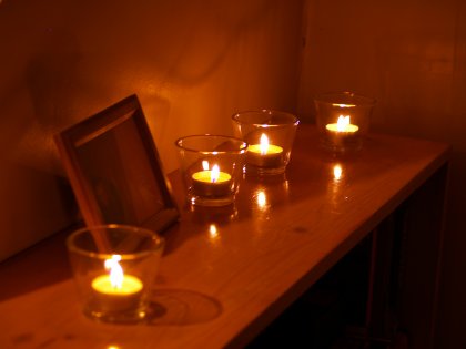 A candle-lit picture frame