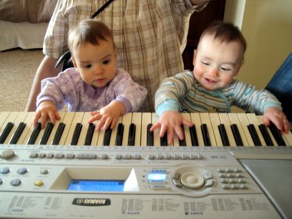 The Twins banging on the piano