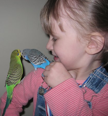 Kaitlyn holding both birds