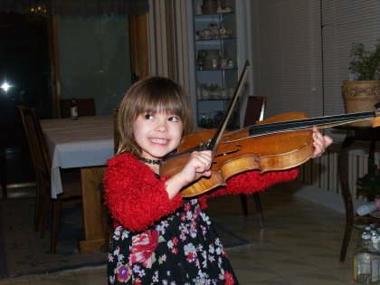 Maddy making sqeaking noises on the Violin